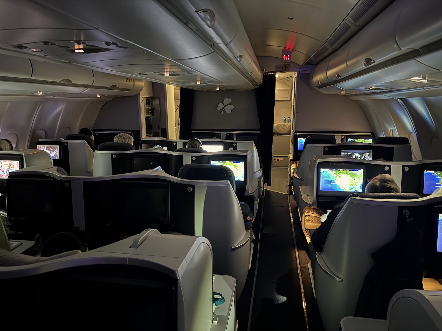 a group of people sitting in an airplane