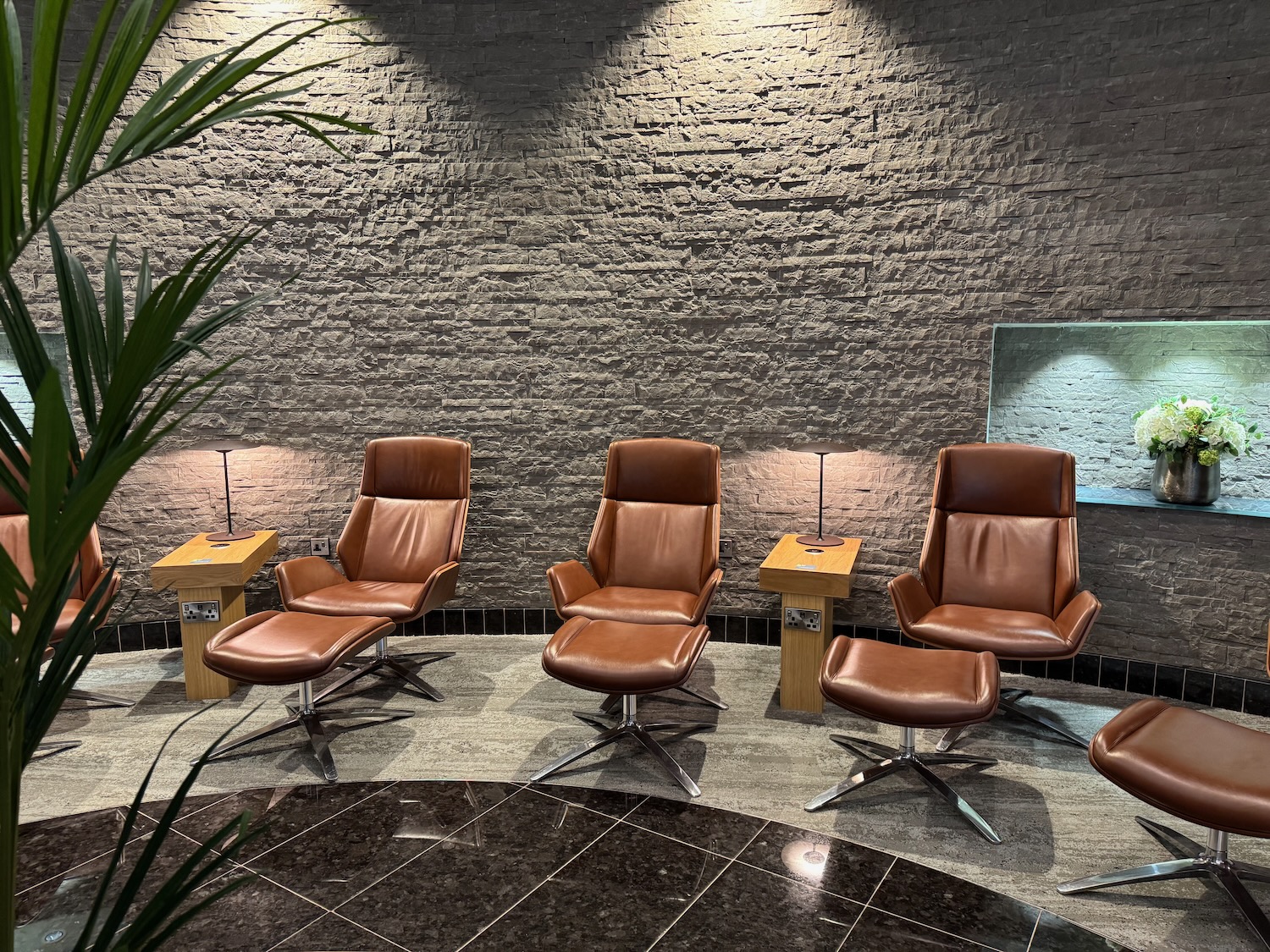 a group of brown chairs in a room