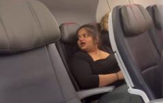 American Airlines passenger kicked off headphones