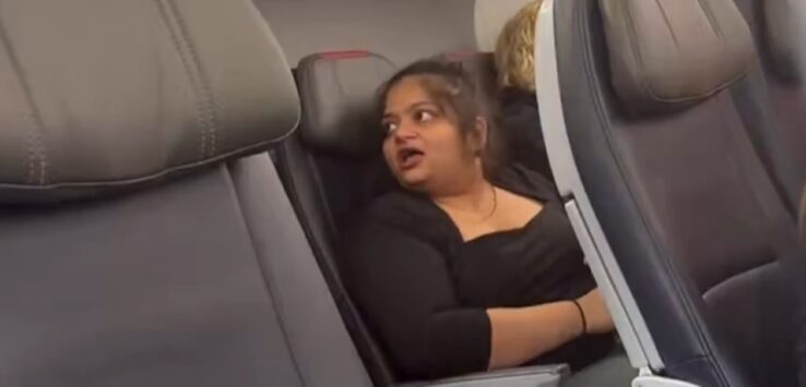 American Airlines passenger kicked off headphones