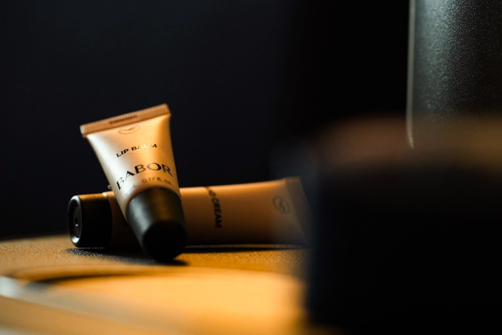 a close up of a tube of lip balm