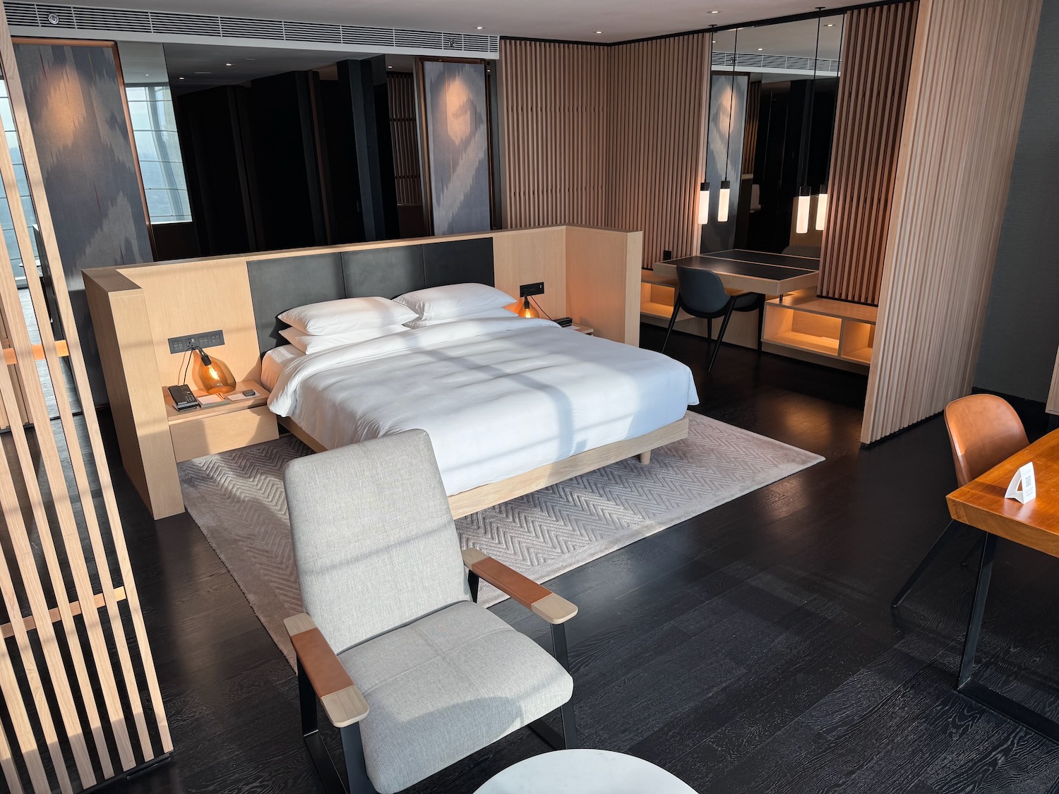 a room with a bed and a chair