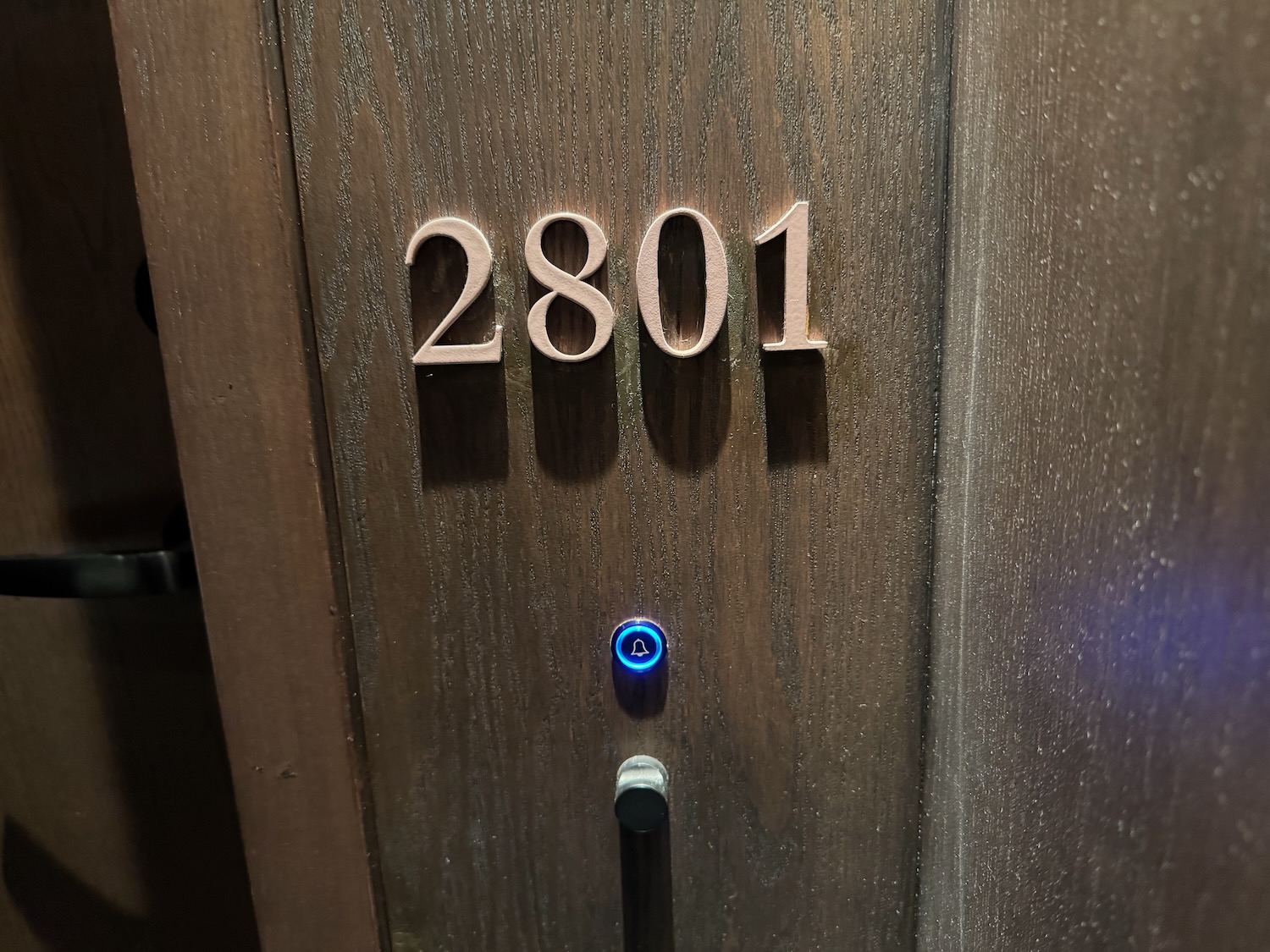 a door with numbers and a button