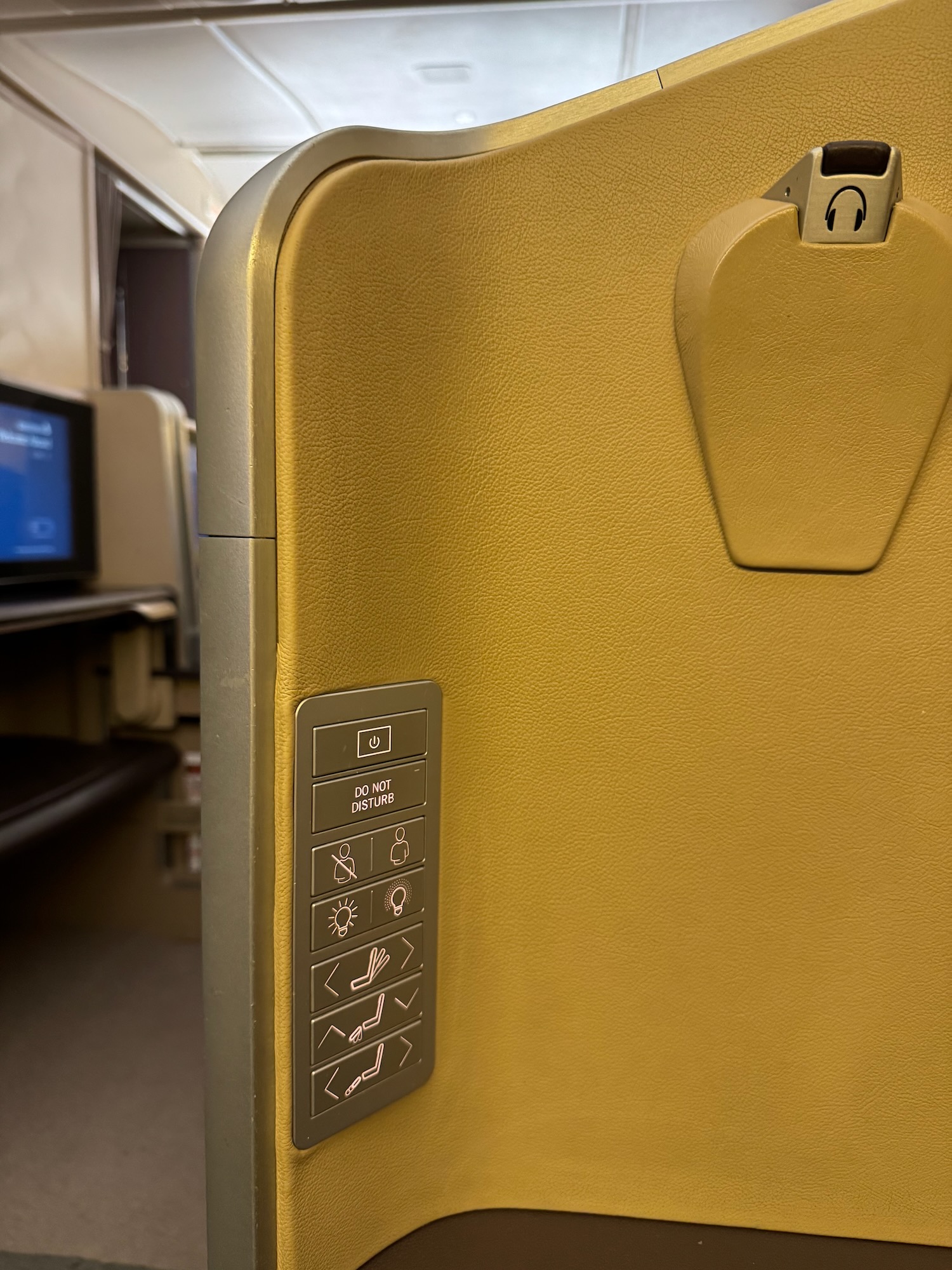 a seat with buttons and buttons on the back of a seat