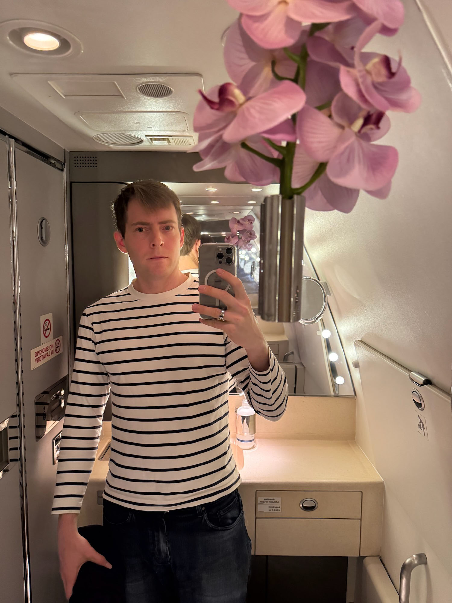 a man taking a selfie in a mirror