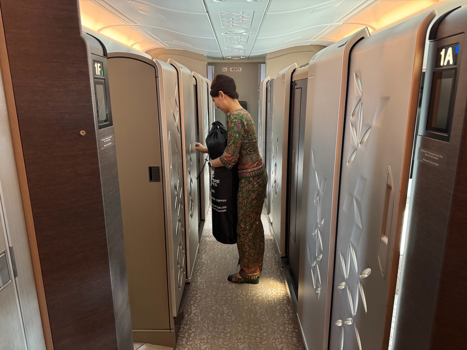 a woman standing in a row of lockers