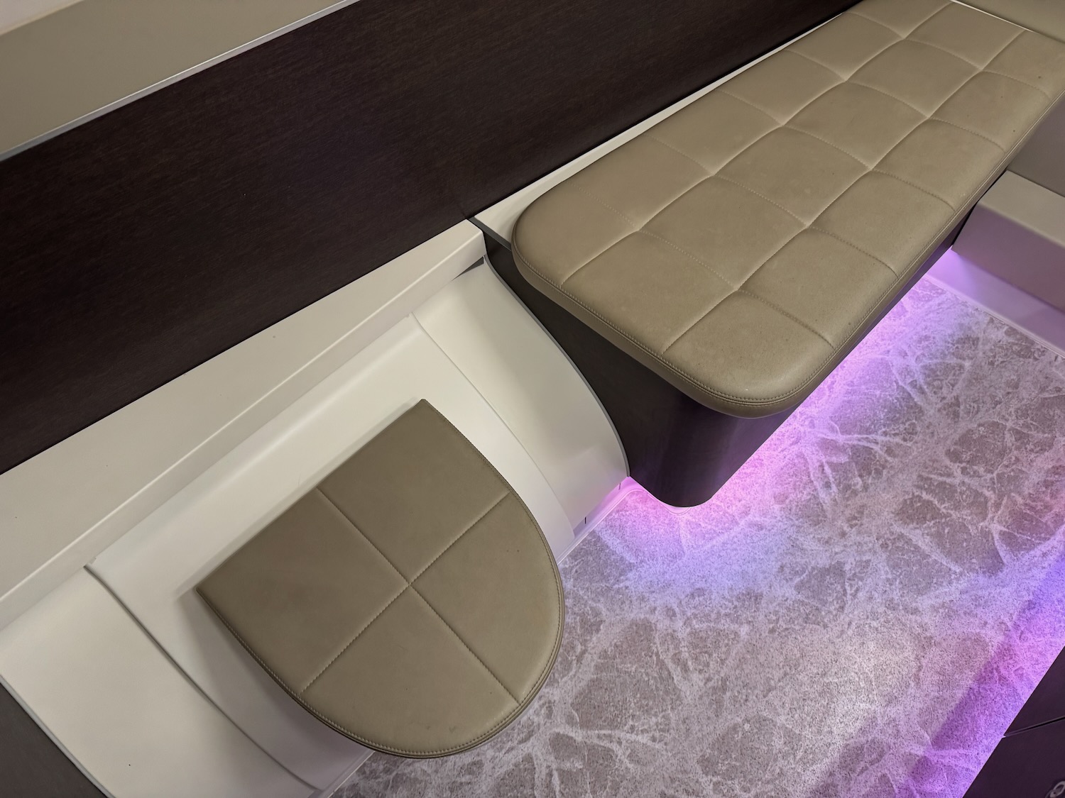 a seat and seat cover on a wall