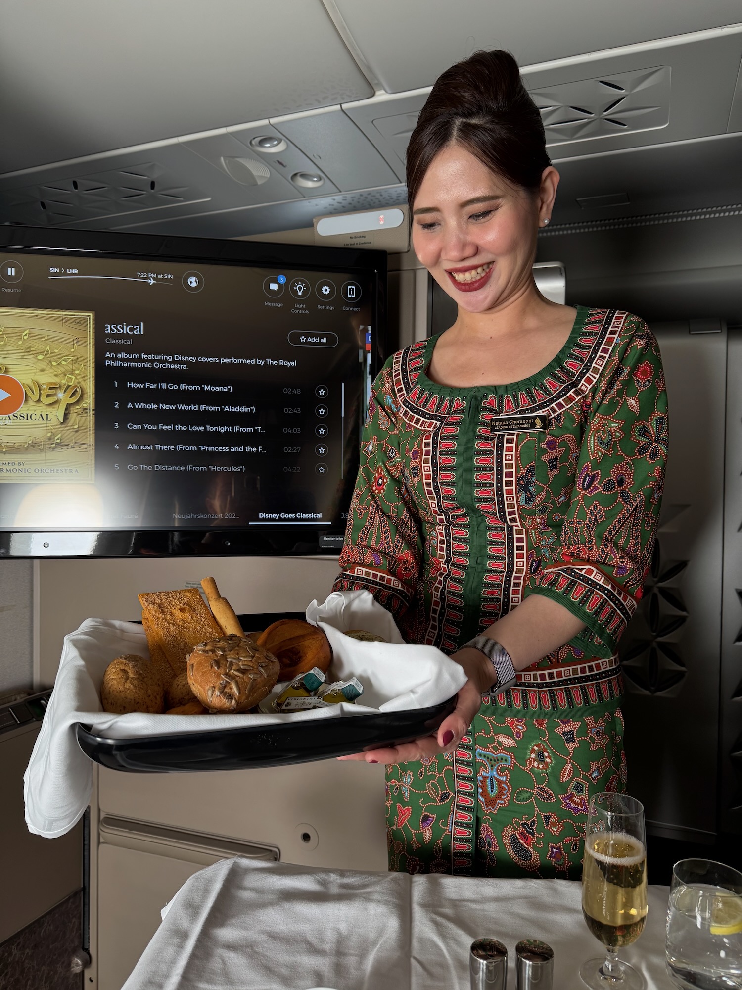 a woman holding a tray of food