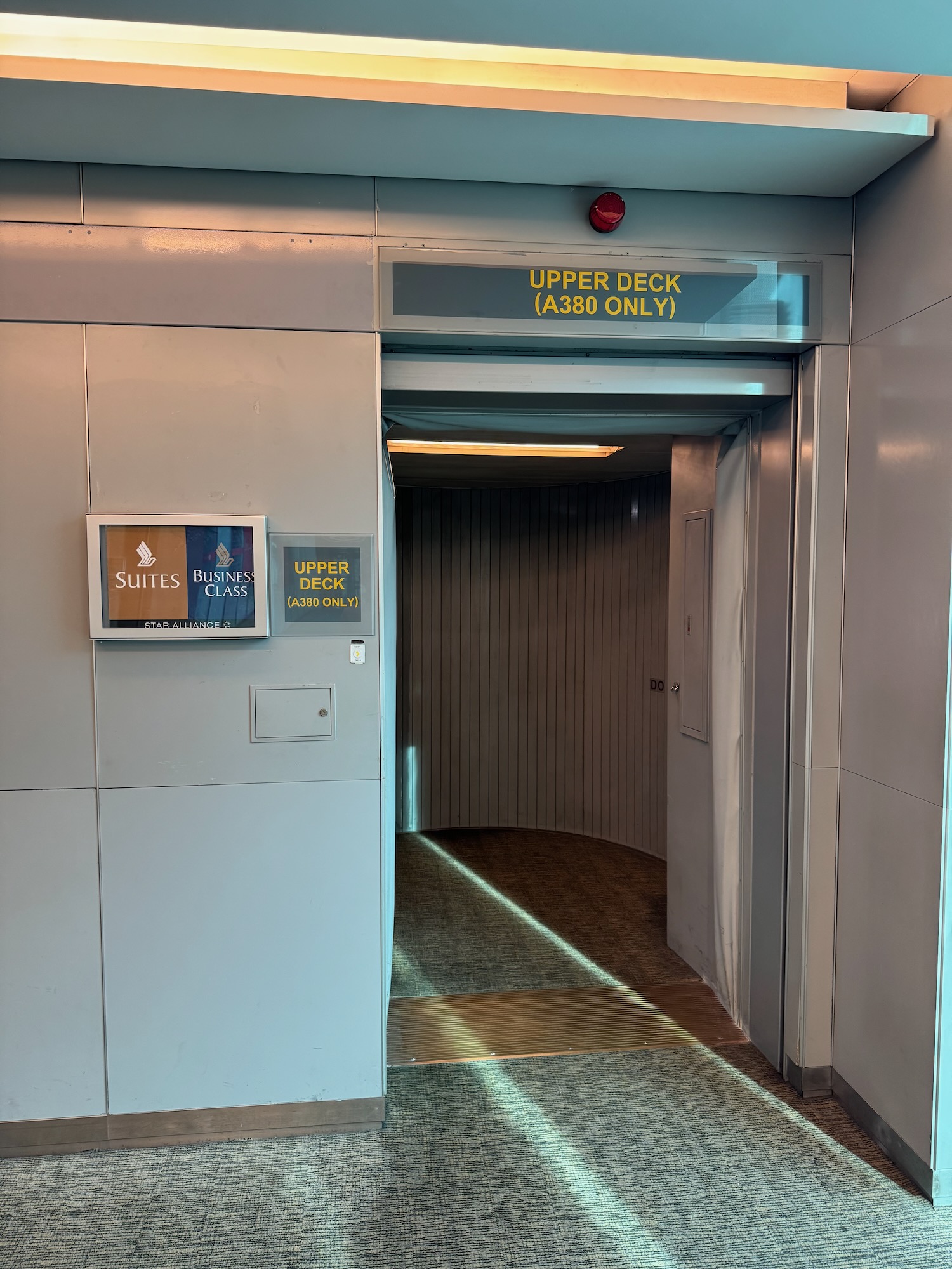 a hallway with a sign on the wall