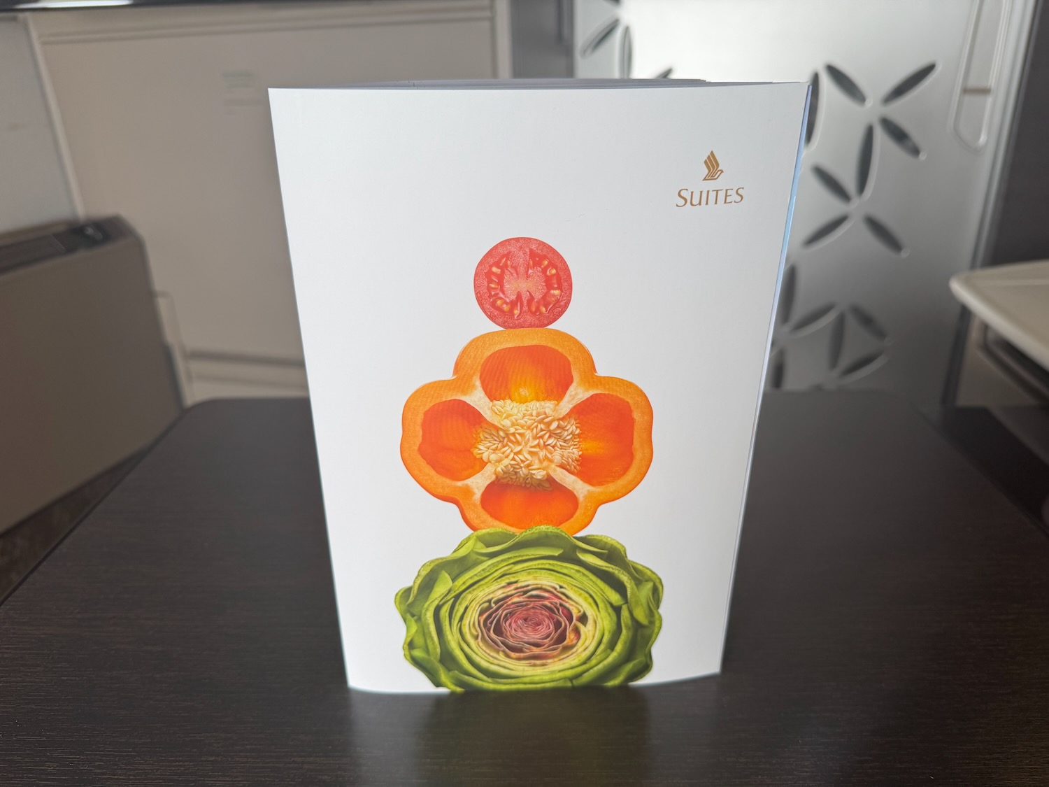 a white box with a flower design on it