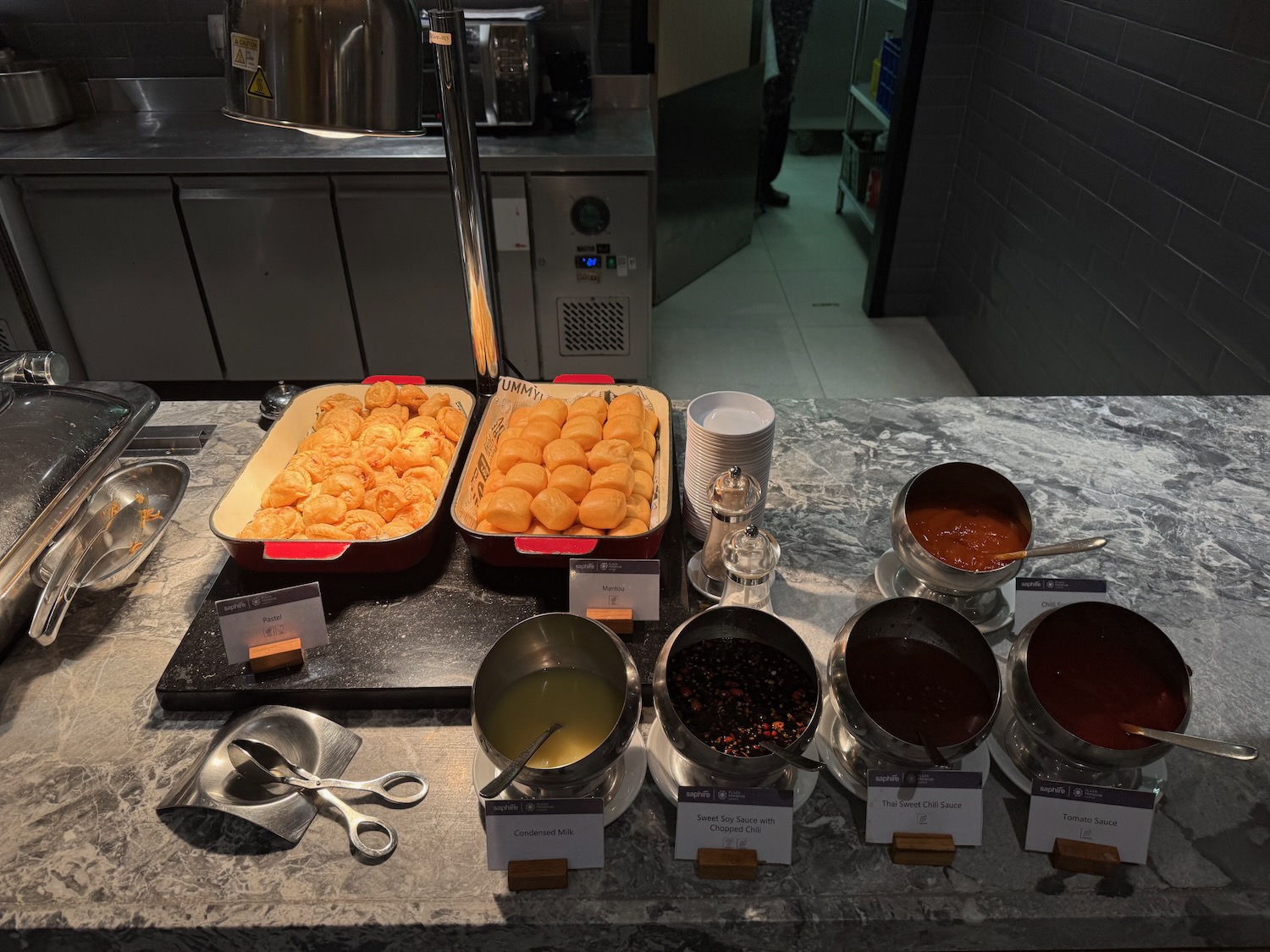 a buffet table with different types of food