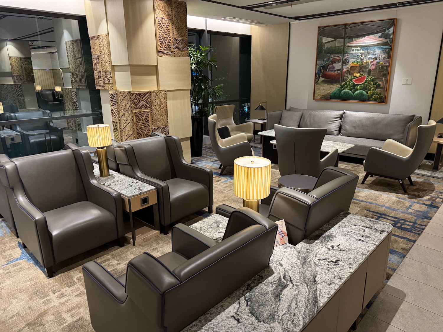 a room with couches and chairs