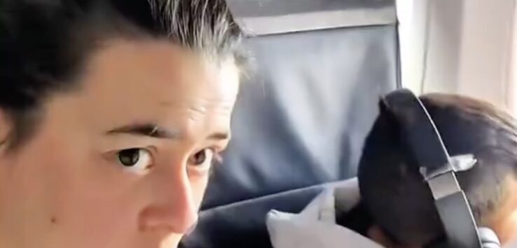 kid kicking seat airplane