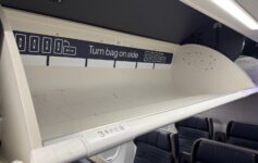 first class overhead bins