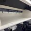 first class overhead bins