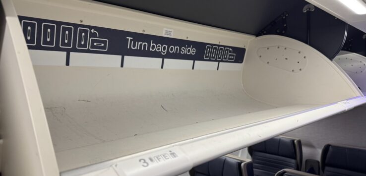first class overhead bins