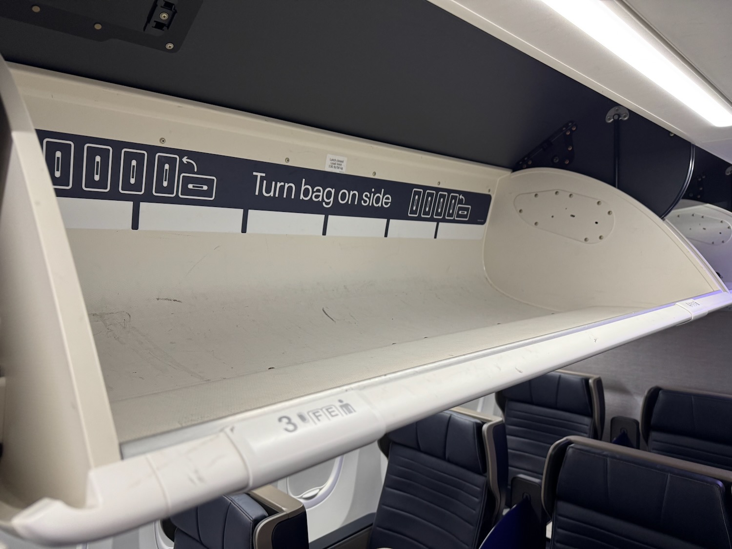 TravelWireDaily — United Flight Attendant Stops Boarding To Shame Economy Passengers Using First Class Bins