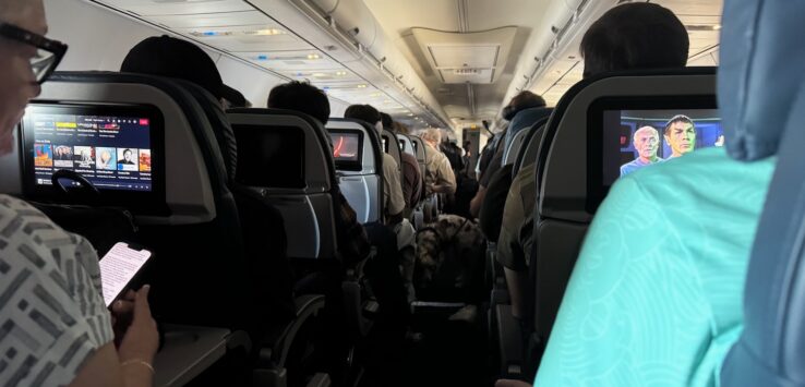 service dog pacing airplane aisle